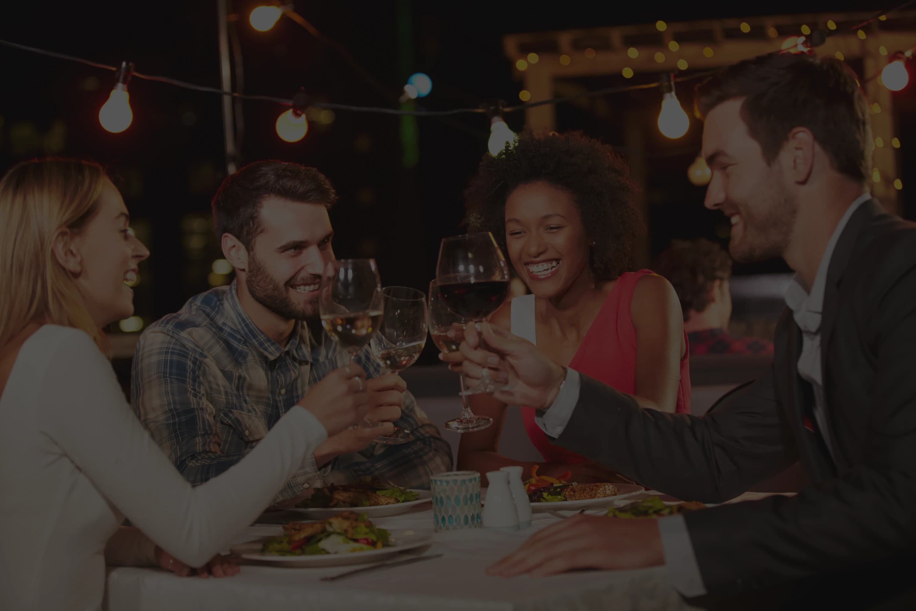 People enjoying dinner together