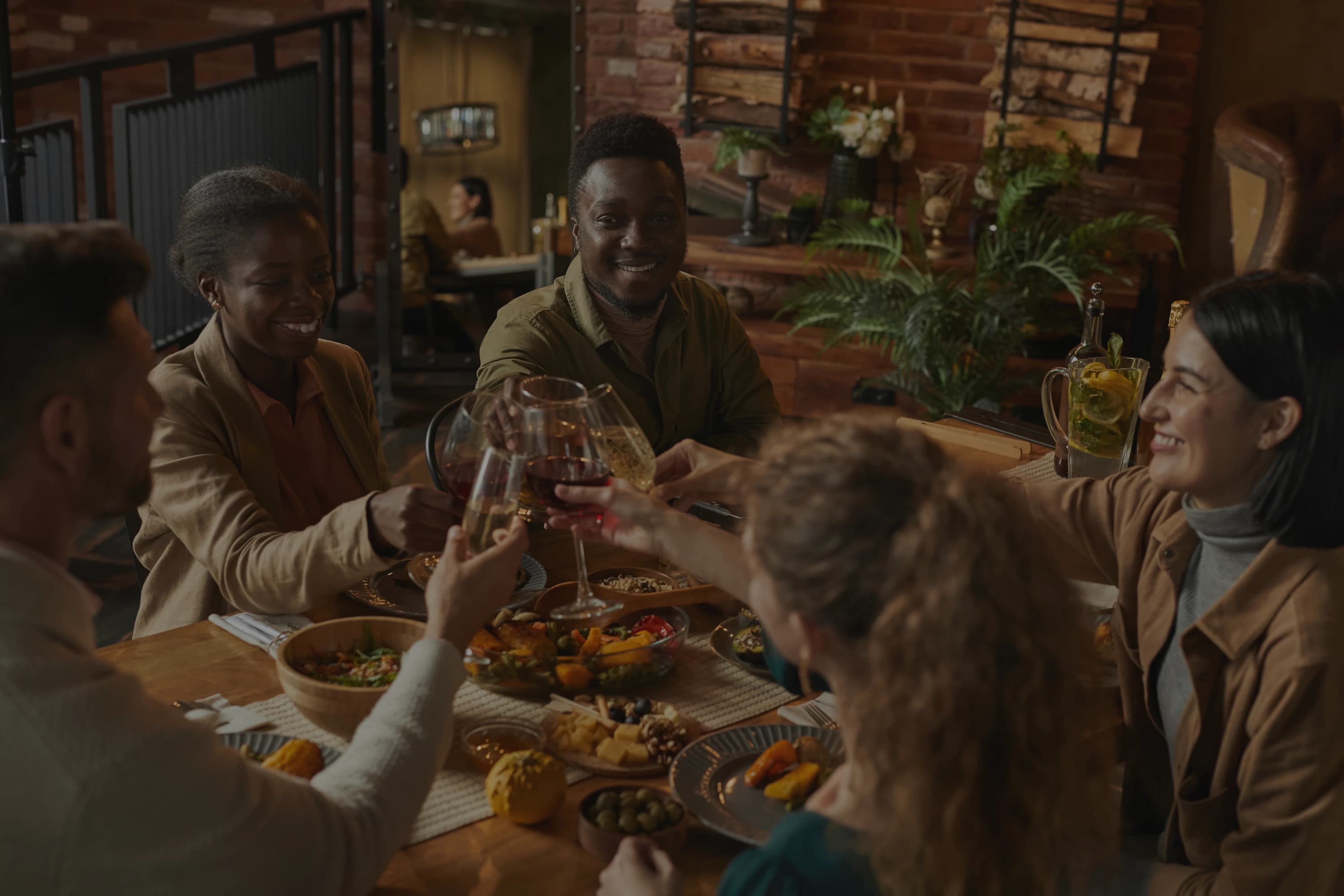 People enjoying dinner together