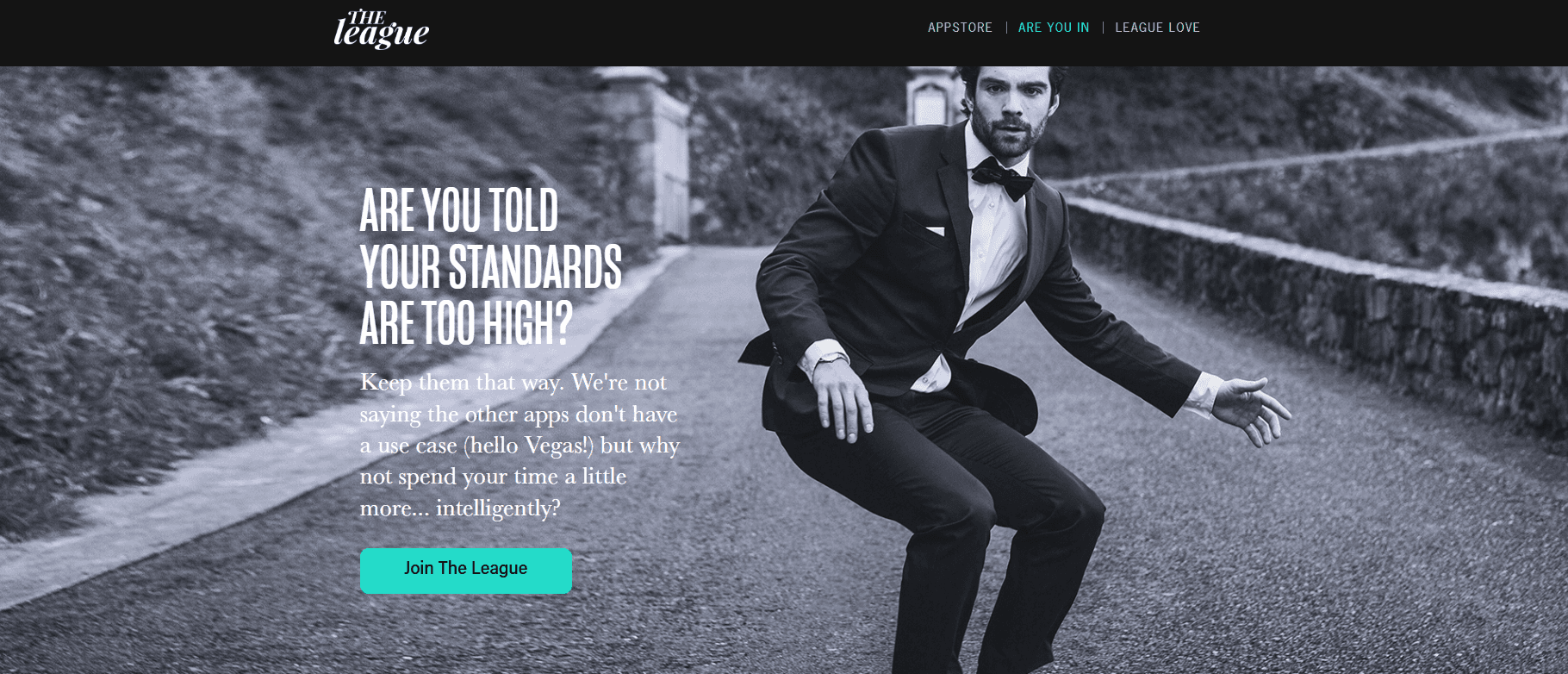 The League homepage in black and white with a man in a tuxedo, the headline "Are you told your standards are too high?" and a Join The League button.